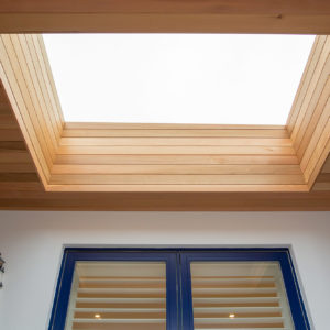 The rooflight above the front door is a clever addition to bring in light to this area of the house