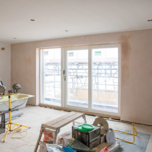 Bi-folds from the the upstairs bedroom opening onto a seafront balcony