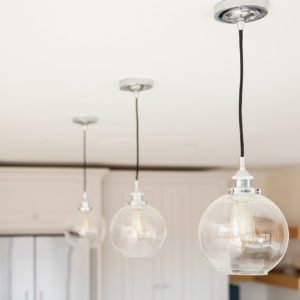 The kitchen is designed by Harvey Jones with a stunning composite hard wearing worktop. The lighting is from John Lewis and the other electrical components from from a local electrical shop.