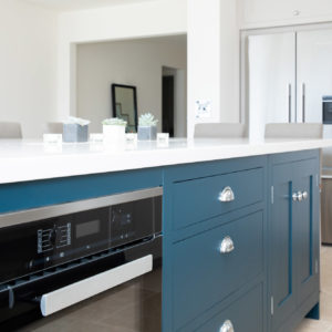 The kitchen is designed by Harvey Jones with a stunning composite hard wearing worktop.