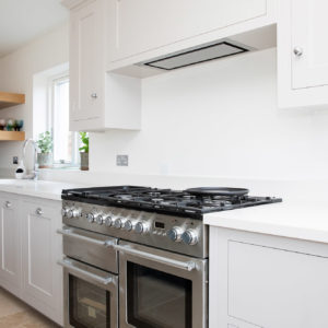 The kitchen is designed by Harvey Jones with a stunning composite hard wearing worktop.