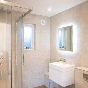 The backlit mirror is an essential for modern bathrooms