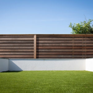 The larch fence finished the slick look of this property