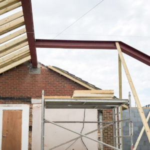 The steels for the vaulted ceiling going in