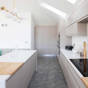 A large kitchen island is a good way to zone an open plan kitchen