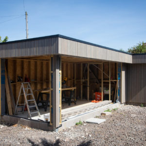 The garden room office is separate from the house