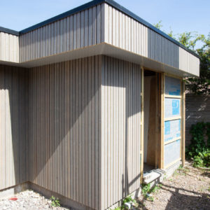 The shed is cleverly disguised in larch cladding also