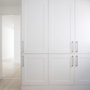 Large storage cupboards in the utility room hides away clutter