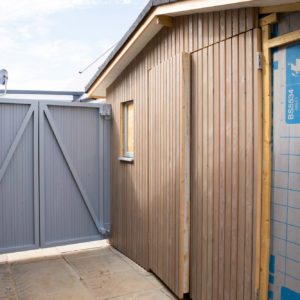 The existing shed was clad in larch which gives a flush and smart finish