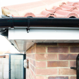Black guttering to match in with the dark frame bifolds