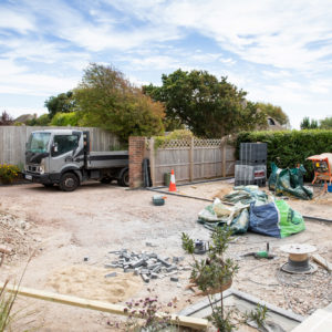 the driveway has been levelled and is prepared for the final layers of stone