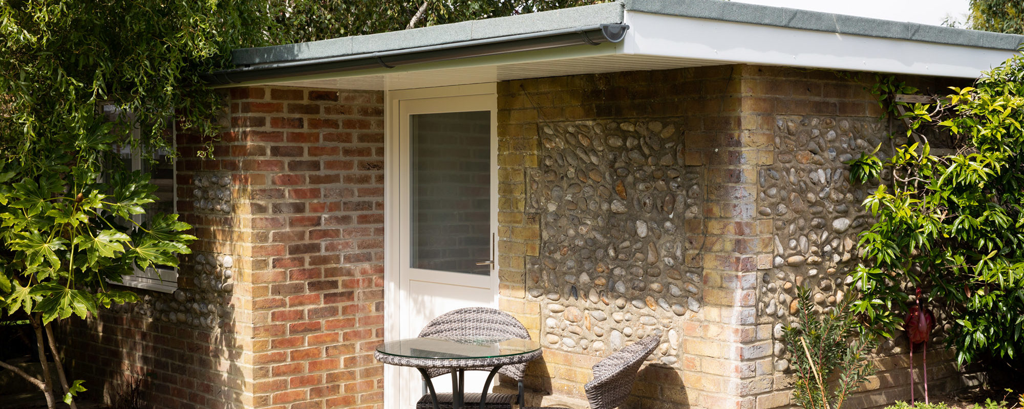 The garden 'shed' complete with rationale door, windows and skylights.