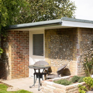 The garden 'shed' complete with rationale door, windows and skylights.