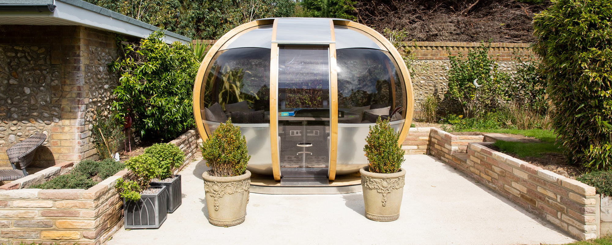 How cool is this garden pod? Sandstone walls retaining the soil that we dug down into