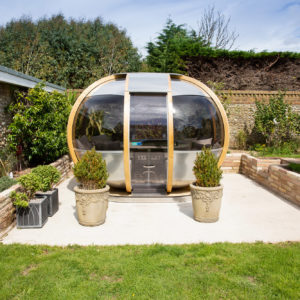 How cool is this garden pod? Sandstone walls retaining the soil that we dug down into