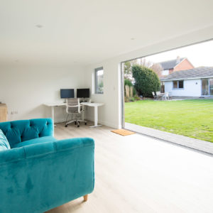 Large bifold doors looking out towards the bifold doors to the house