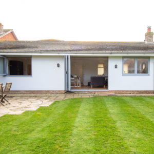 The rear of the property showing the new windows and bifold doors