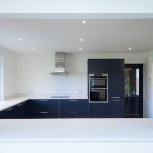 The large hatch looking into the kitchen from the living space