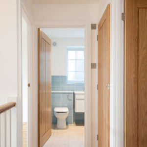 The new oak floor and oak door are a classic combination