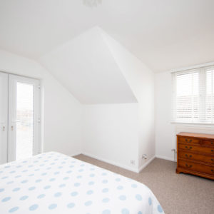 View across bedroom showing new juliet balcony, and new UPCV windows