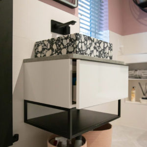 The wall hung sink vanity unit helps create the illusion of more space