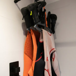 Dedicated rail for hanging wetsuit storage