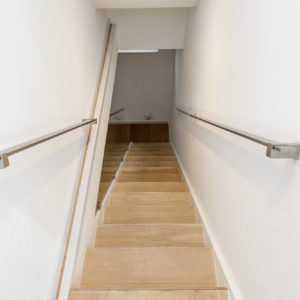 New glass balustrade and steel hand rails