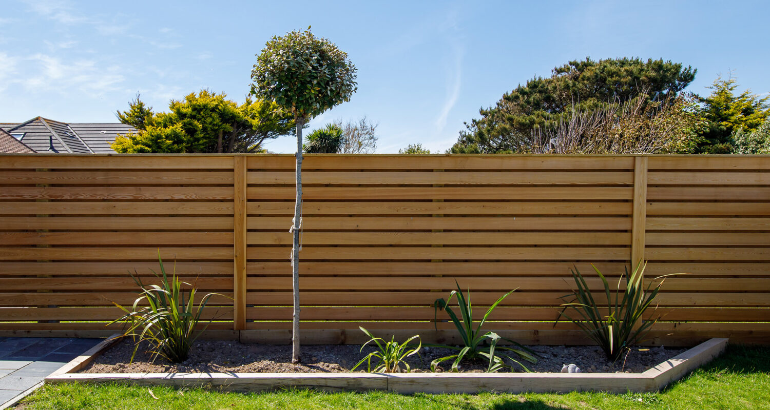 Oak sleepers line the flower beds - these will be fully planted in due course