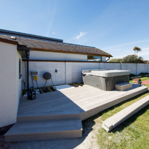 We built a framework on top of the existing concrete base to allow the hot tub to have a slightly sunken appearance