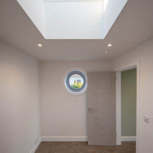 A large roof light lets lots of light into this hallway