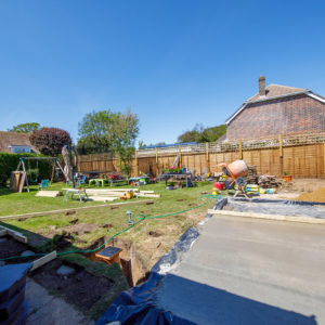 Patio area to connect to the decking wrapping around the house