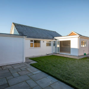 The garden has a couple of patio areas that make good use of the sunny areas throughout the day