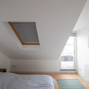 This upstairs bedroom will be dramatically changed with full height ceilings and bigger windows for the sea view