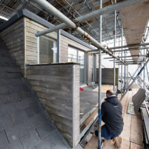 We are taking the balcony back to the steels to extend it full width