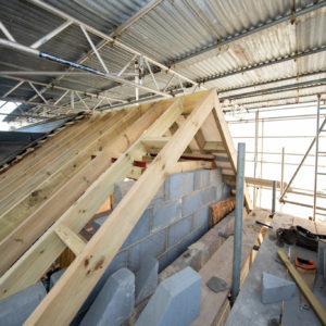 The roofline has been extended full width of the house