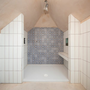 Feature tiles add some luxury to this walk in shower