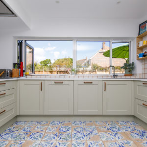 fun moroccan style tiles bring this howdens kitchen to life