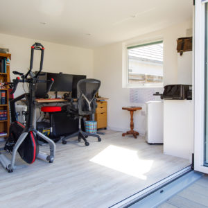 the garden room is now a home office, gym, and storage space