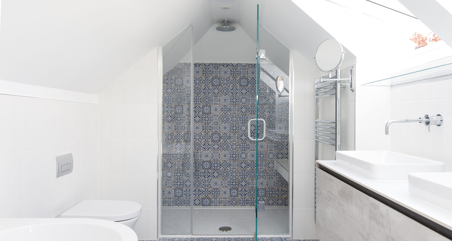 moroccan style tiles tie this look together and give the room a spa-like feel