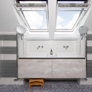 a double sink unit complete with double velux windows