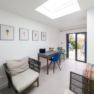 The roof lantern adds a nice layer of light to the room.