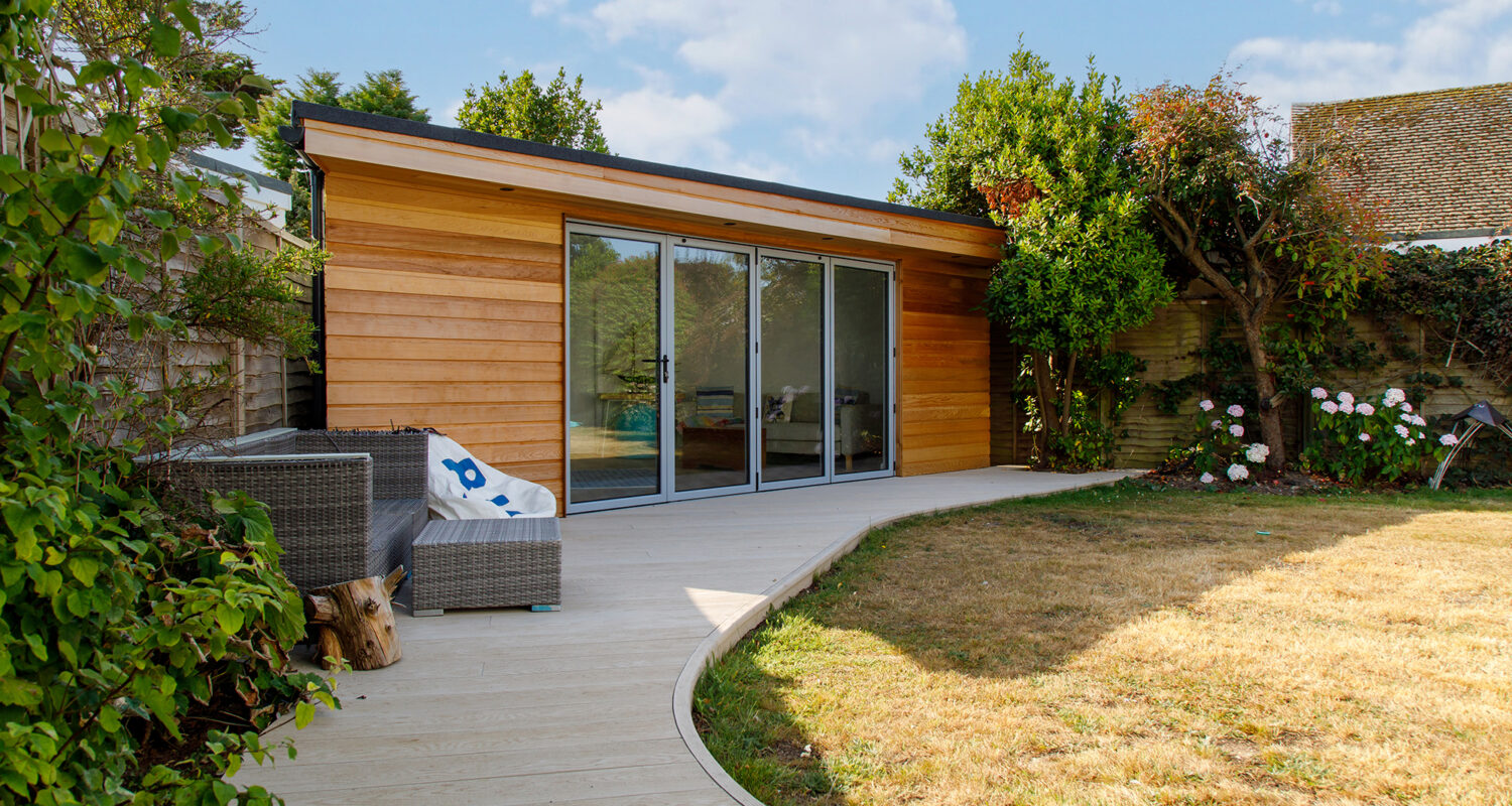 We laid a curved composite decking from the main house to link to the garden room.