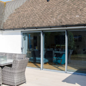 We have fitted large sliding doors from the kitchen onto the new decking area.