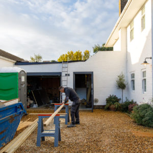 The existing garage roof is being strengthened to support a solar panel system