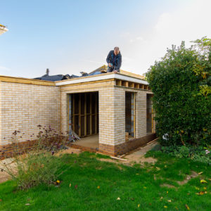 In the garden we installed a soak well to deal with all the extra run off water from the flat roofs