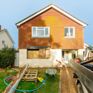 This 1980's house is under going a full renovation and the exterior will be finished in vertical larch wood cladding