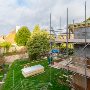 The view from a bedroom showing the new extension and knocked down garage