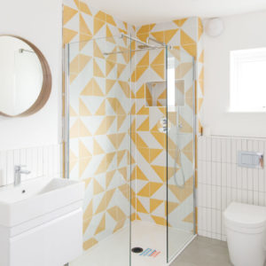 One of newly refurbished bathrooms. The same tiles as the kitchen have been used but vertically. Clever!