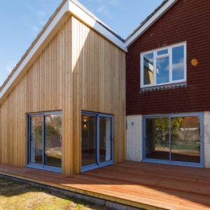 The vertical larch cladding really accentuates the height of the new extension