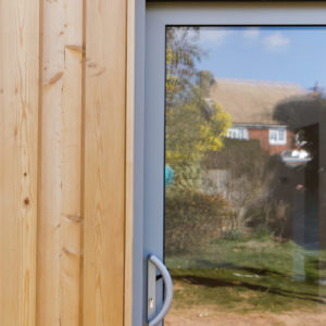 The larch looks great against the grey sliding door frame